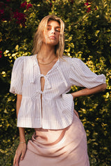 Corey Peplum Top In White - Final Sale
